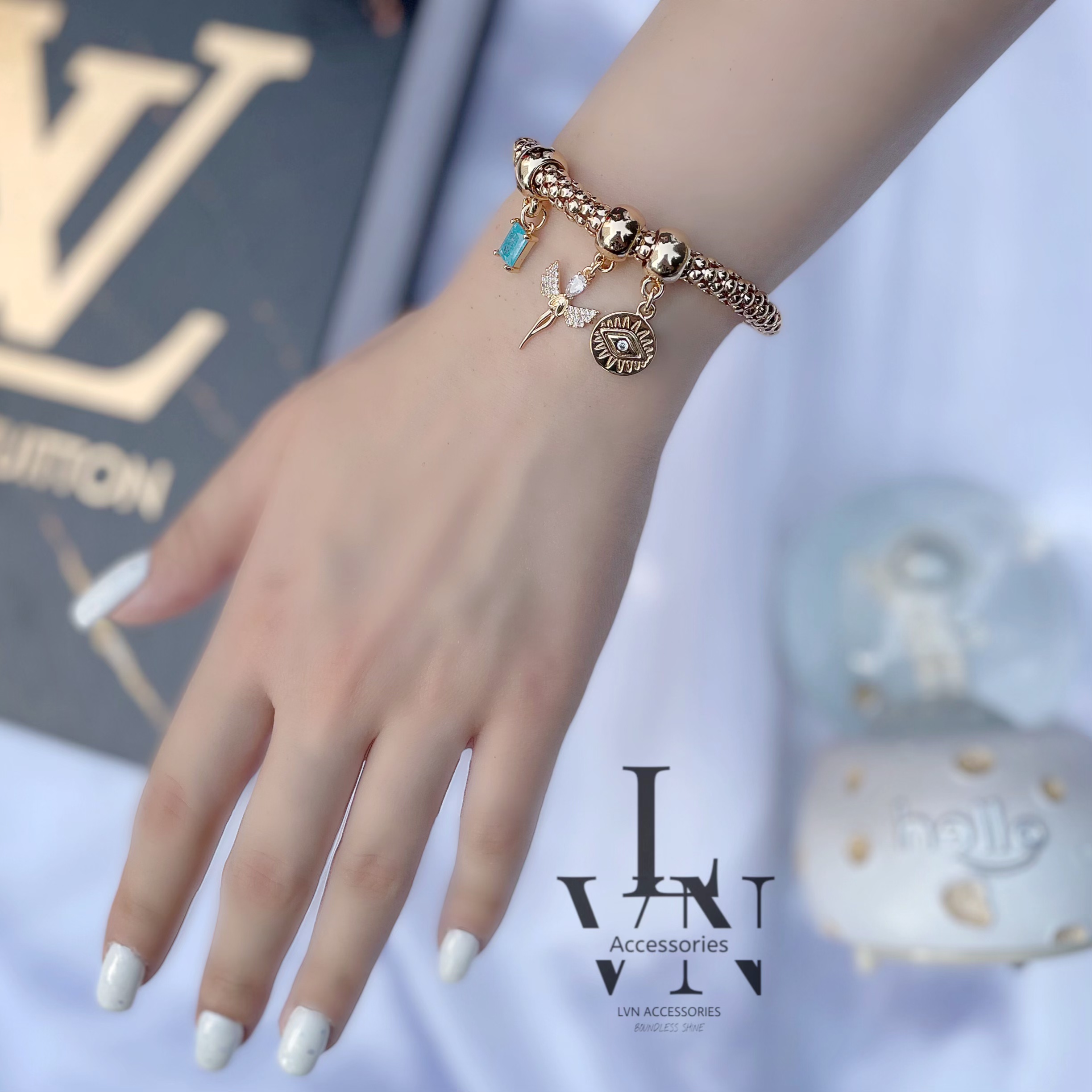 دستبند جسیکا آویز دار طرح فرشته طلایی